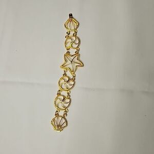 Goldtone Nautilus & Starfish Seashell Charm Bracelet 7"
